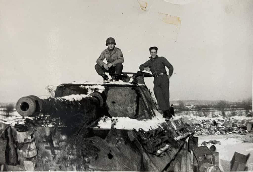 Two soldiers on a WWII Tank
