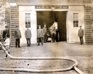 The firehouse on Westfield St in Dedham, Massachusetts. January 1, 1906. Source: Wikipedia